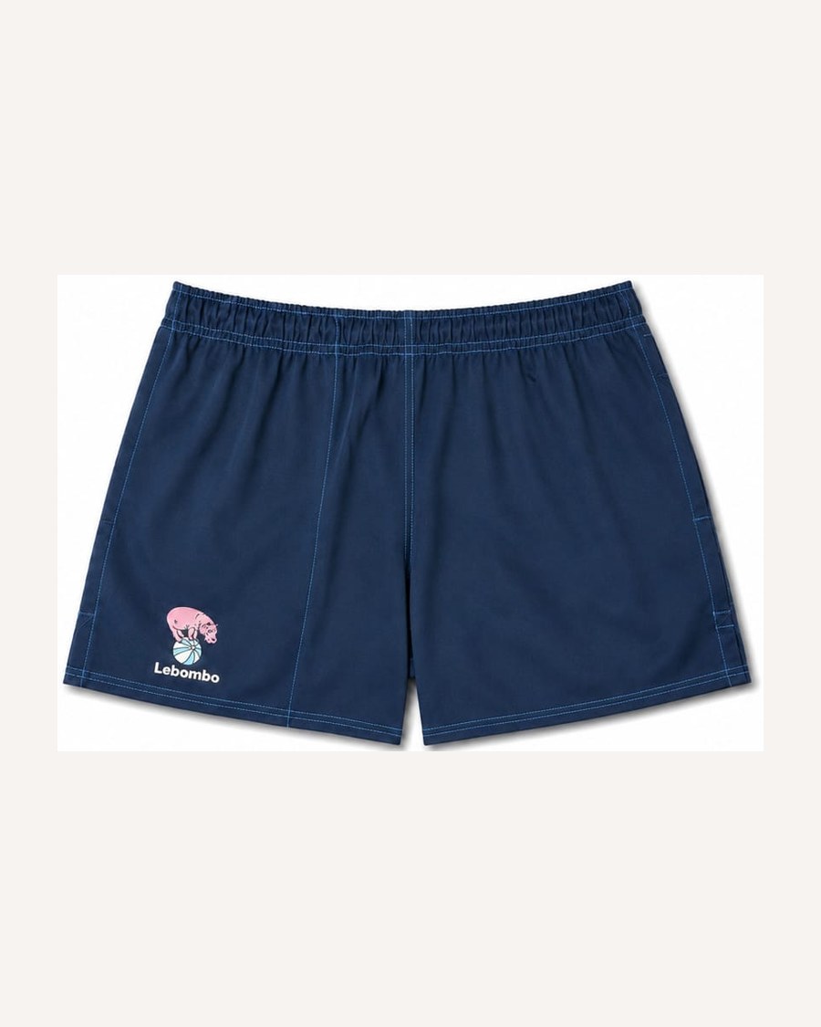 The Lebombo shorts in navy cotton, with the hippo mark above the hem.