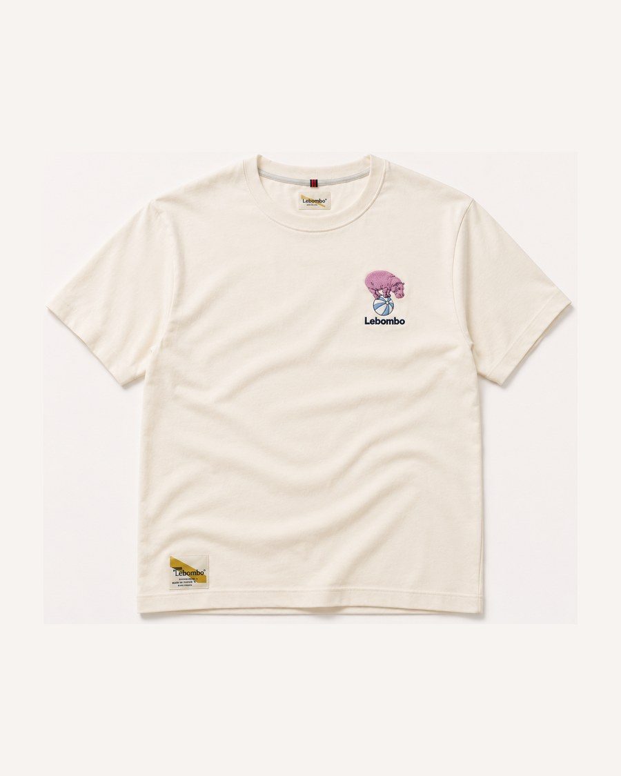 The Lebombo tee in ecru cotton, with the hippo mark embroidered at the chest.